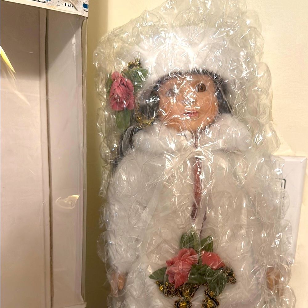 Elegant Winter Doll with Pink Accents